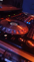 DJ performs at dimly lit venue in Lokoja, Nigeria