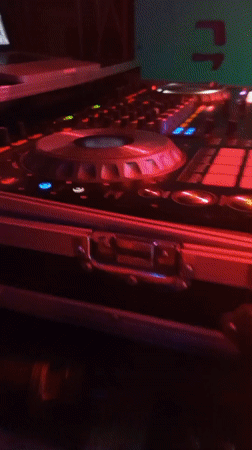 DJ performs at dimly lit venue in Lokoja, Nigeria