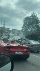 Red Ferrari convertible spotted at Varna traffic light