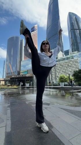 Low-angle fashion shot outdoors in Khimki, Russia