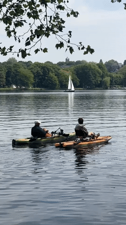 Two kayakers enjoy sunny morning on Essen lake