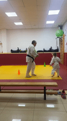 Martial arts instructor leads children's judo session in Sochi