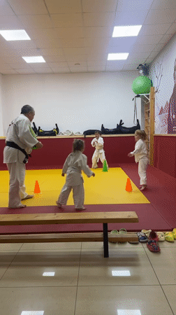 Martial arts instructor leads children's judo session in Sochi
