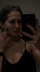 Woman documents skincare routine in Dubai bathroom selfie video