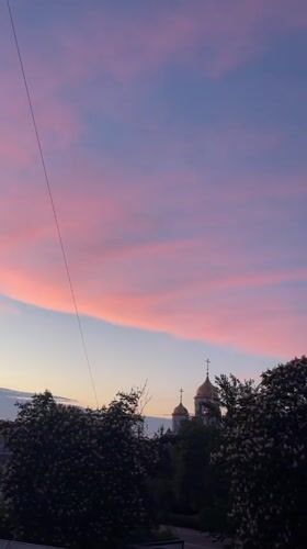 Evening documentation in Ternopil captures church views, pets, food