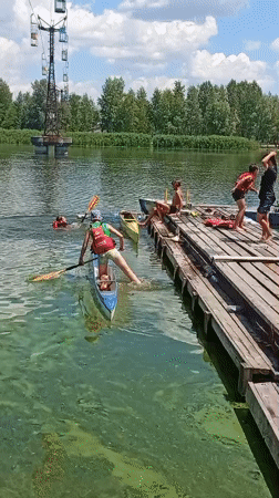 Paddleboarding and canoeing on the Dnipro River on a summer morning