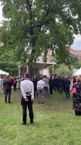 Formal gathering on a Kyiv park lawn