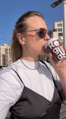 Casual street scenes documented in Bat Yam featuring woman, mirrored sphere