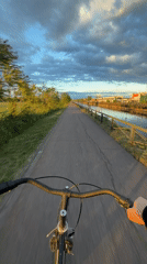 Evening bicycle ride and sunset captured in Italian countryside