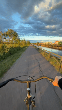 Evening bicycle ride and sunset captured in Italian countryside