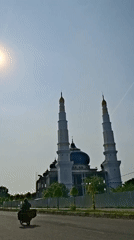 Baiturrahman Grand Mosque documented under clear Indonesian skies