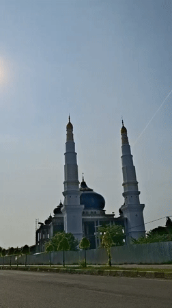 Baiturrahman Grand Mosque documented under clear Indonesian skies
