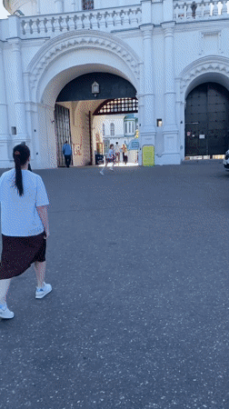Visitors document New Jerusalem Monastery complex in bright afternoon