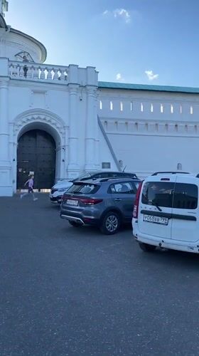 Visitors document New Jerusalem Monastery complex in bright afternoon