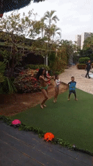Families enjoy evening recreation at Porlamar resort pools