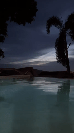 Evening swim and meal prep at Thai residence