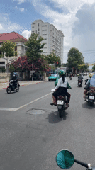 Morning motorcycle traffic documented in Nha Trang Ward