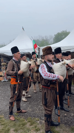 Bulgarian folk musicians gather with bagpipes in Lyaskovets celebration