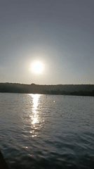 Sunny riverside moment captured in Oxel, India