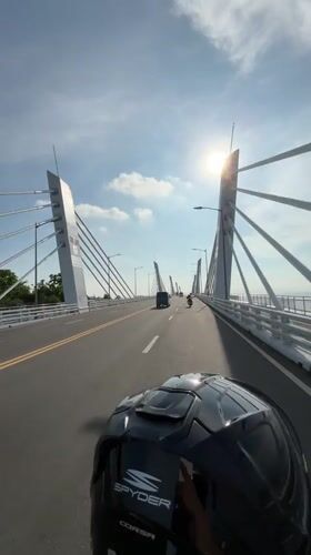 Motorcyclist crosses Francisco Bangoy Bridge in Davao City