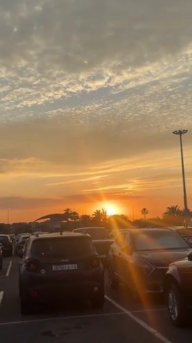 Sunset illuminates Marrakesh parking lot, captured by witnesses