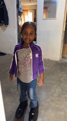 Young girl photographed in casual moments around Jos home