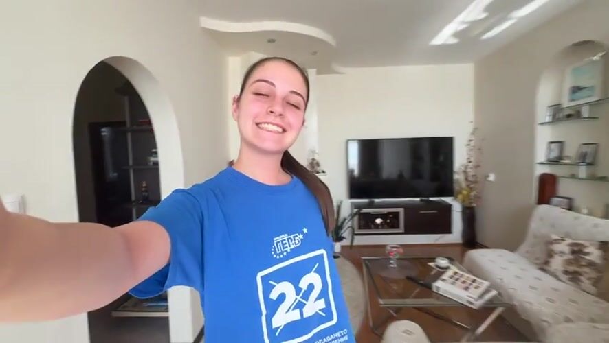 Young woman documents casual moments in Bulgarian home setting