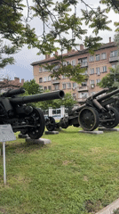 Visitor documents military museum display in Sofia, Bulgaria