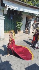 Colorful traditional procession winds through Dalegan streets
