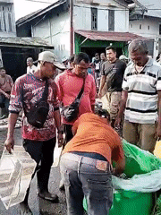 Early morning fish market bustles in Lhokseumawe, Indonesia