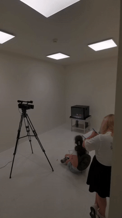 Inside a Prague art installation with video projections and parquet floors