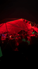 Outdoor party with DJ under geodesic dome in Arambol