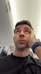 Concerned airline passenger shows distress during flight near Tbilisi