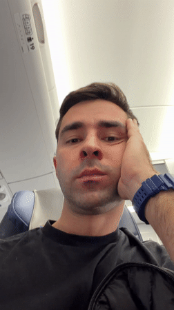 Concerned airline passenger shows distress during flight near Tbilisi