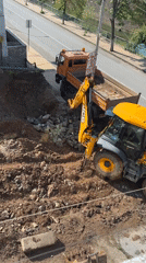JCB backhoe conducts demolition work in Zlatograd, Bulgaria