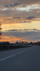 Sunset captured on video along road in Beryozovka, Russia