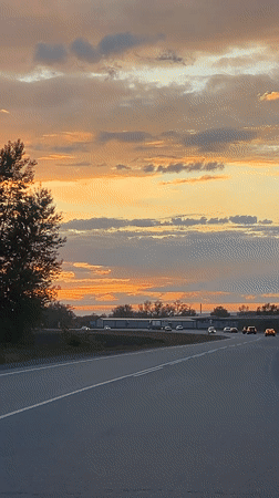 Sunset captured on video along road in Beryozovka, Russia