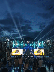 Outdoor evening event lights up Nha Trang with flags and live stage