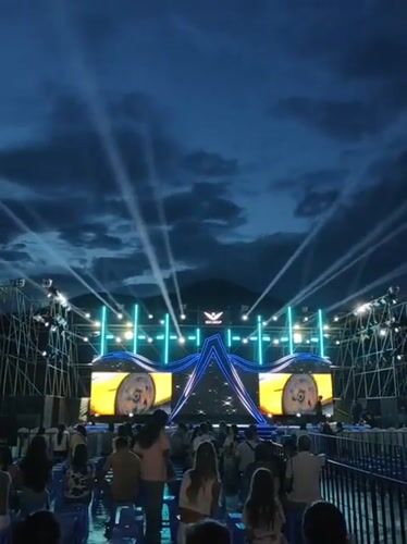 Outdoor evening event lights up Nha Trang with flags and live stage