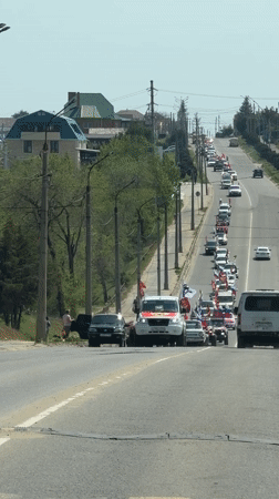 Flag-bearing vehicle convoy observed in Kamyshin, Russia