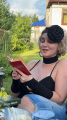 Backyard gathering with food and reading in Izhevsk
