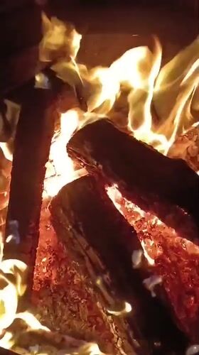 Summer solstice evening in Viadana: fires, fields, and sunset