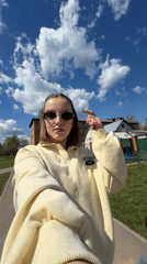 Woman documents morning beauty routine and playground outing in Russia