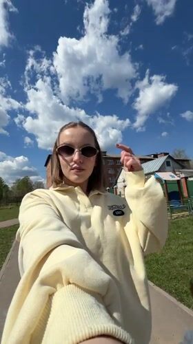 Woman documents morning beauty routine and playground outing in Russia