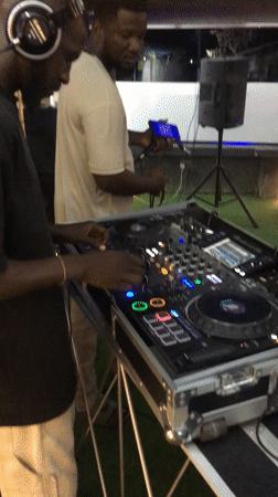 DJ and partygoers captured at indoor social gathering in Kubwa