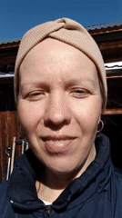 Woman photographed outdoors in rural Russia during early morning