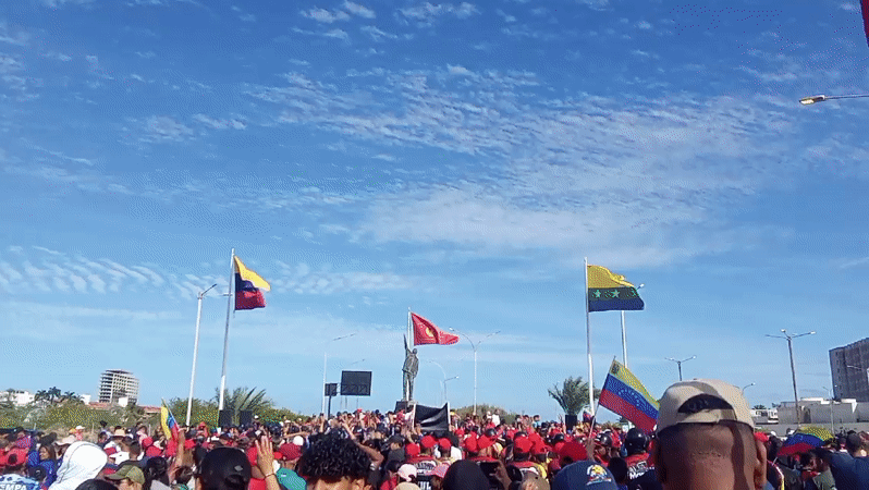 Red-clad crowds rally in Porlamar, Venezuela near Chávez monument