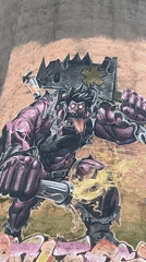 Grotesque Purple Figure Mural Spotted on Sofia Cooling Tower