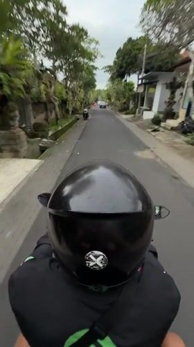 Scooter rider captured on video in Ubud District