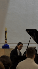 Pianist performs on grand piano in Tbilisi